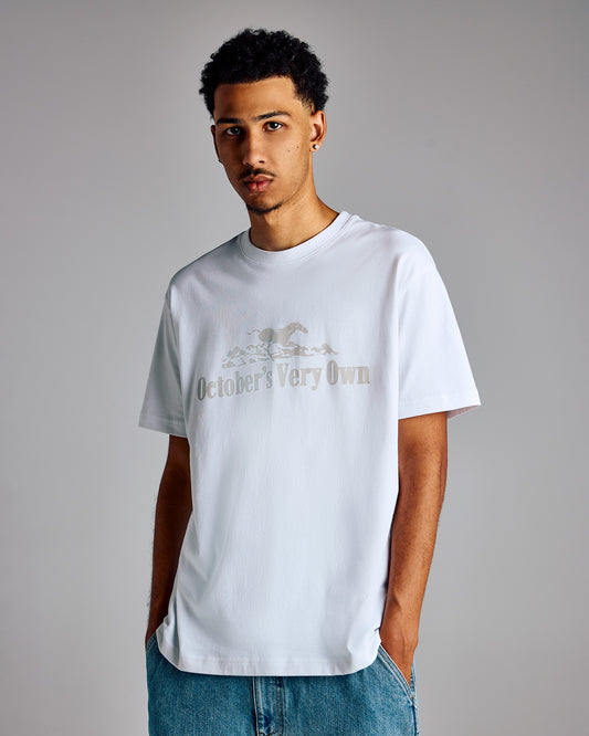 White t-shirt with horse graphic and text print on chest.