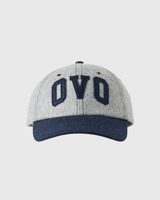 Heather grey wool cap with dark navy OVO logo embroidered on front and navy brim.