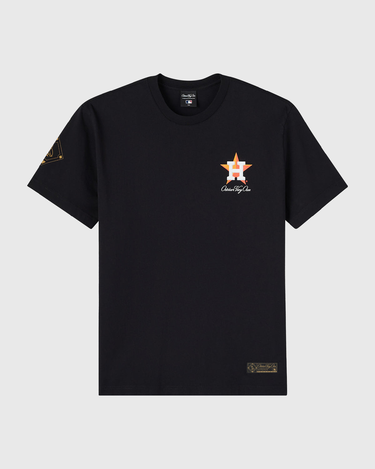 Black crewneck t-shirt with Houston Astros star logo on chest and small embroidered patches on sleeves and hem.