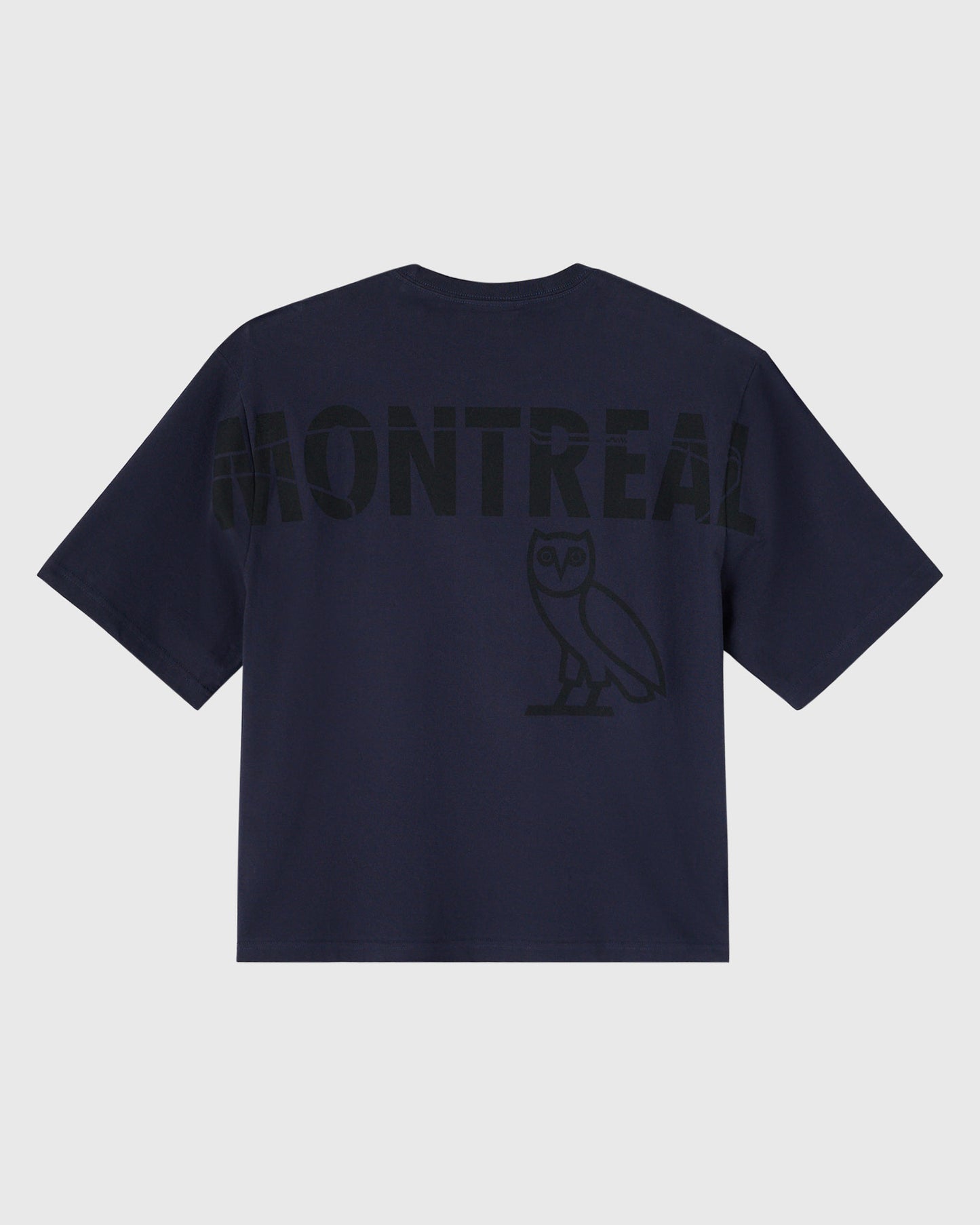 Navy short-sleeve t-shirt with "Montreal" text and owl logo printed on back.
