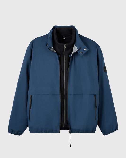 Blue rain shell jacket with black inner layer, stand collar, front zip closure, and zip pockets.