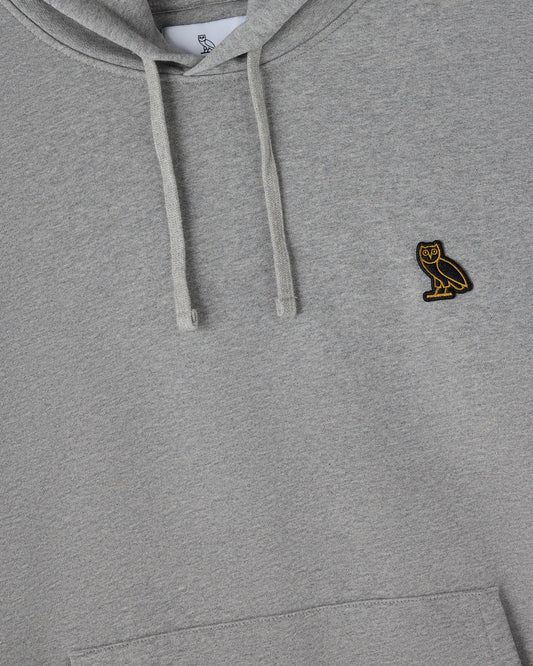 Heather grey pullover hoodie with drawstring and small owl embroidered logo on chest.