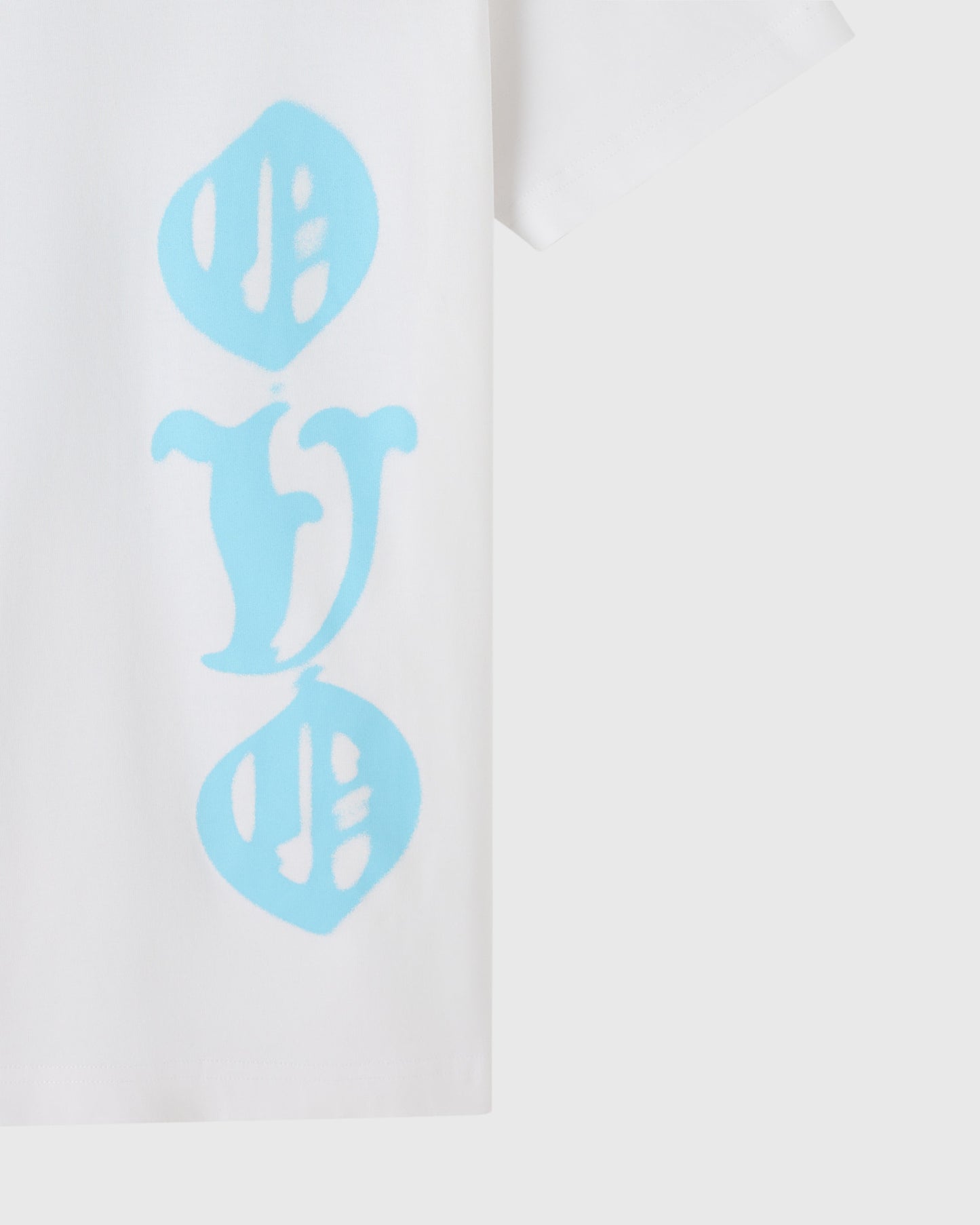 White t-shirt with light blue airbrush graphic design featuring abstract shapes and symbols.