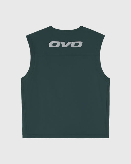 Midnight green sleeveless vest with OVO logo printed on chest.