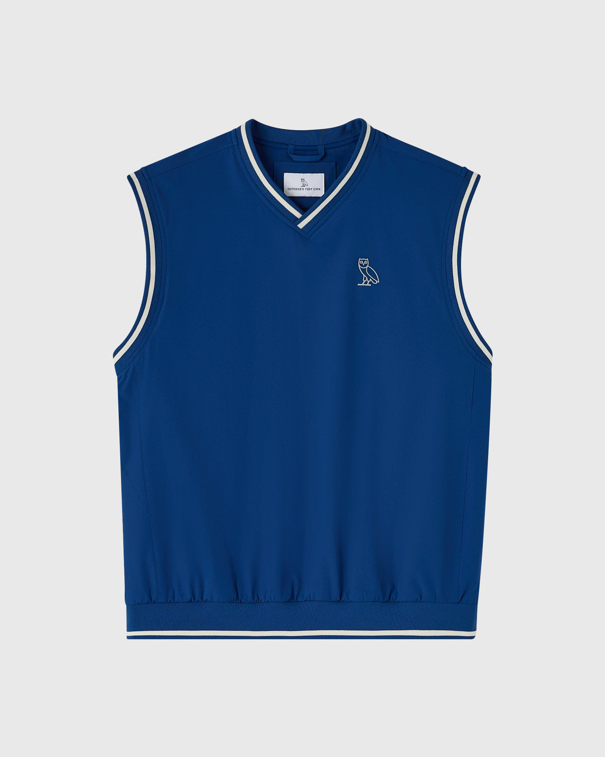 Deep denim blue sleeveless pullover vest with white stripe trim and small owl logo on chest.