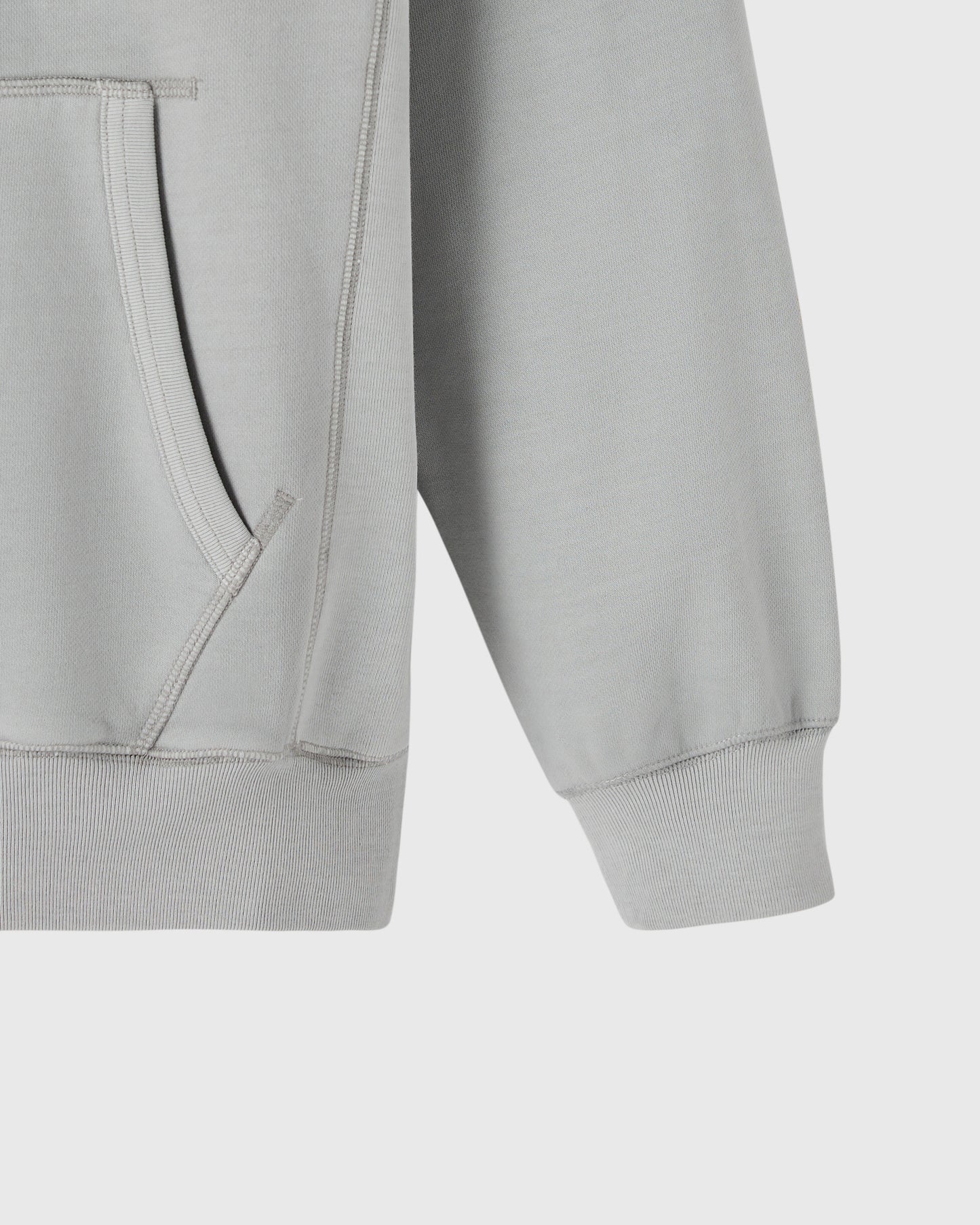 Gray raglan hoodie with full-zip front, ribbed cuffs and hem, shown from side detail view.