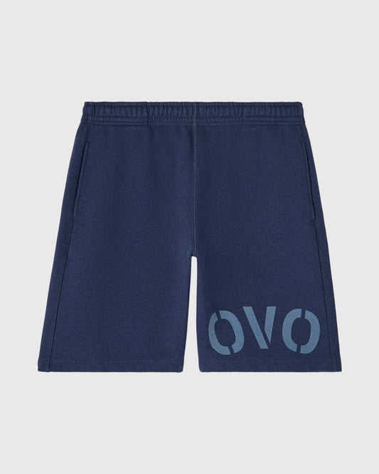 Navy sweatshorts with elastic waistband and "OVO" graphic printed on right leg.