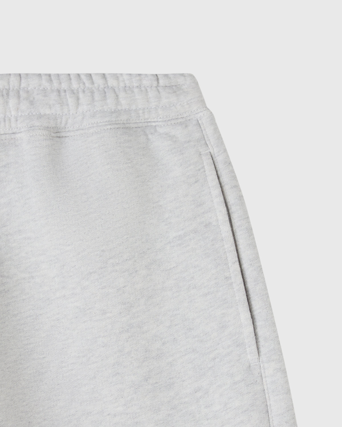 Ash heather grey shorts with elastic waistband and side pocket detail.