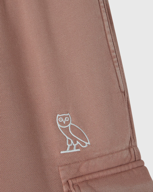 Clay pink cargo sweatpant with white owl embroidery on thigh and ribbed cuffs.