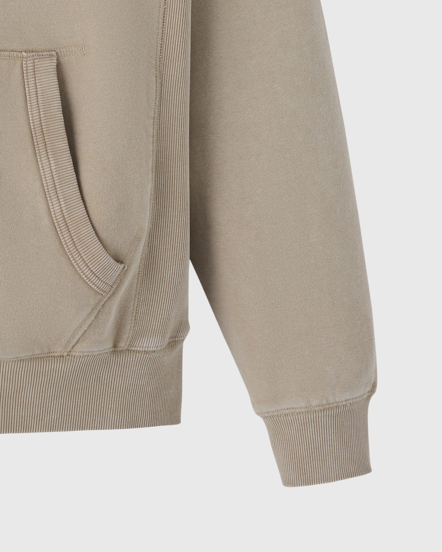 Sandstone full-zip hoodie with raglan sleeves, ribbed cuffs, and kangaroo pocket detail.