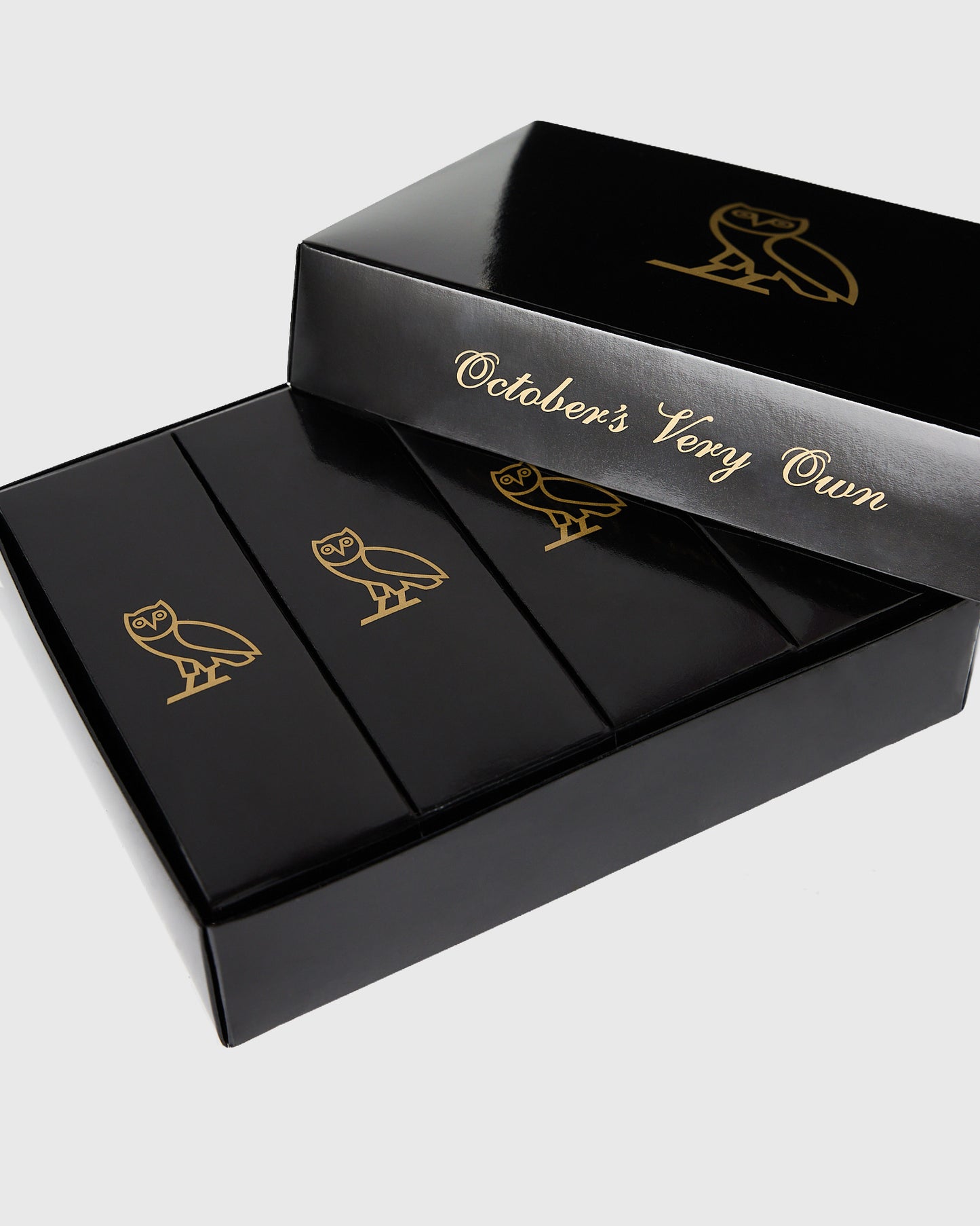 Black box with three compartments displaying Callaway Chrome Tour Triple Diamond golf balls with gold owl logo design.
