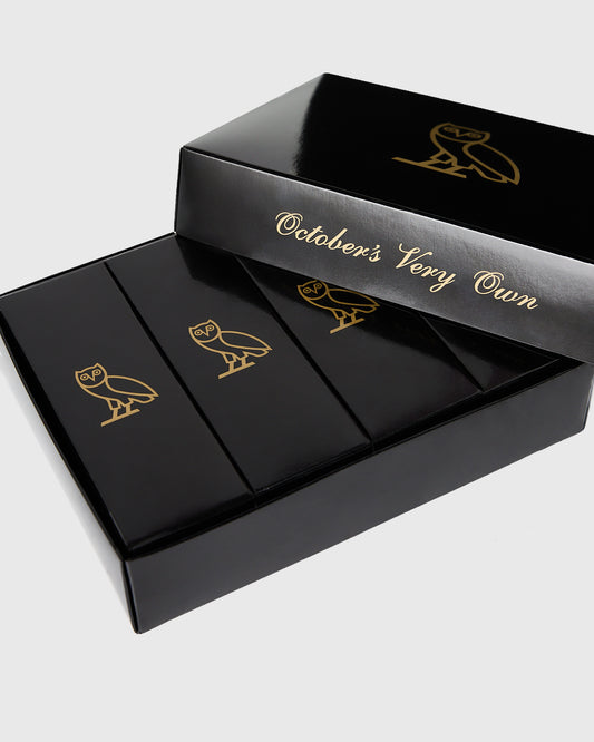 Black box with three compartments displaying Callaway Chrome Tour Triple Diamond golf balls with gold owl logo design.