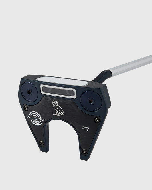 Black Odyssey Ai-ONE putter with laser logo, white alignment stripe, and gray shaft against neutral background.