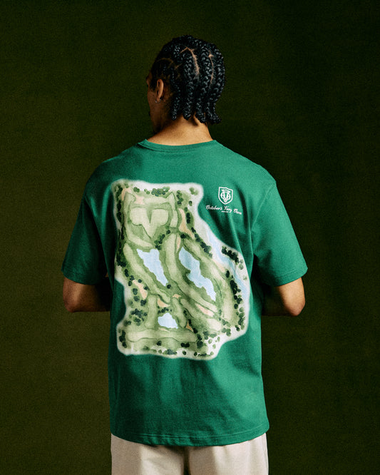Lush green t-shirt with golf course layout graphic on back and small logo on chest.