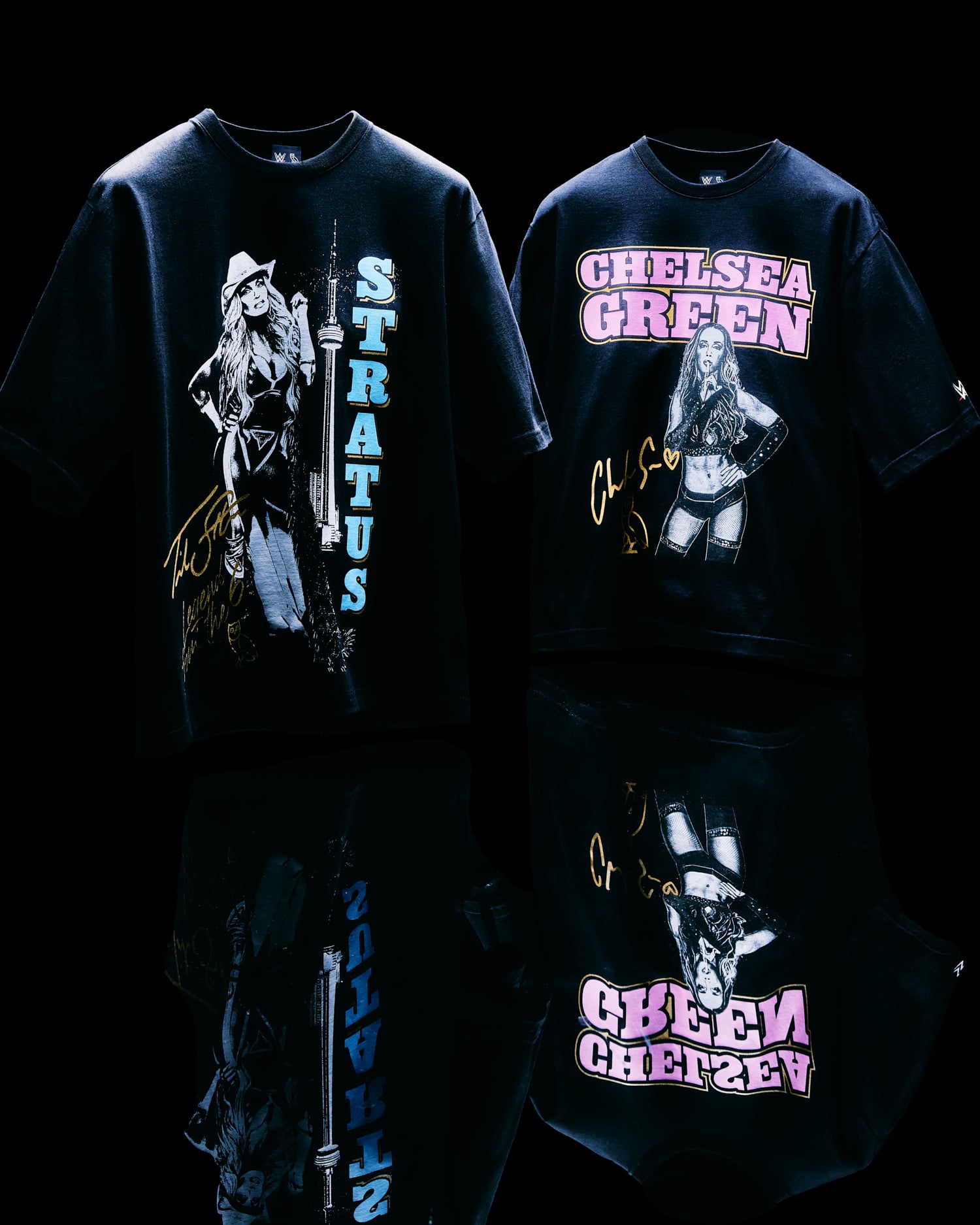 Two black October's Very Own x WWE t-shirts with graphic designs and text on a reflective surface.