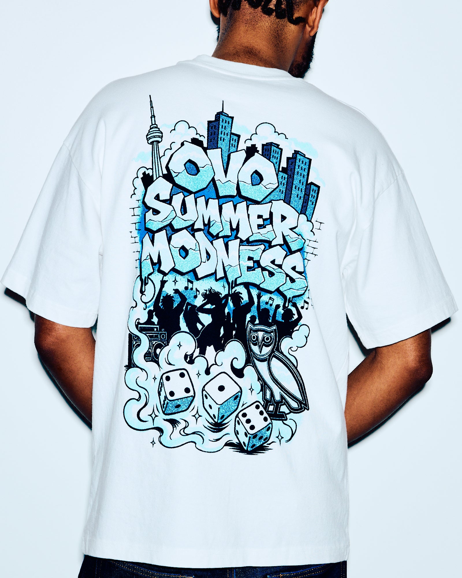 Off-white t-shirt with blue and black graphic print featuring "Summer Madness" text, cityscape, silhouettes, and dice on back