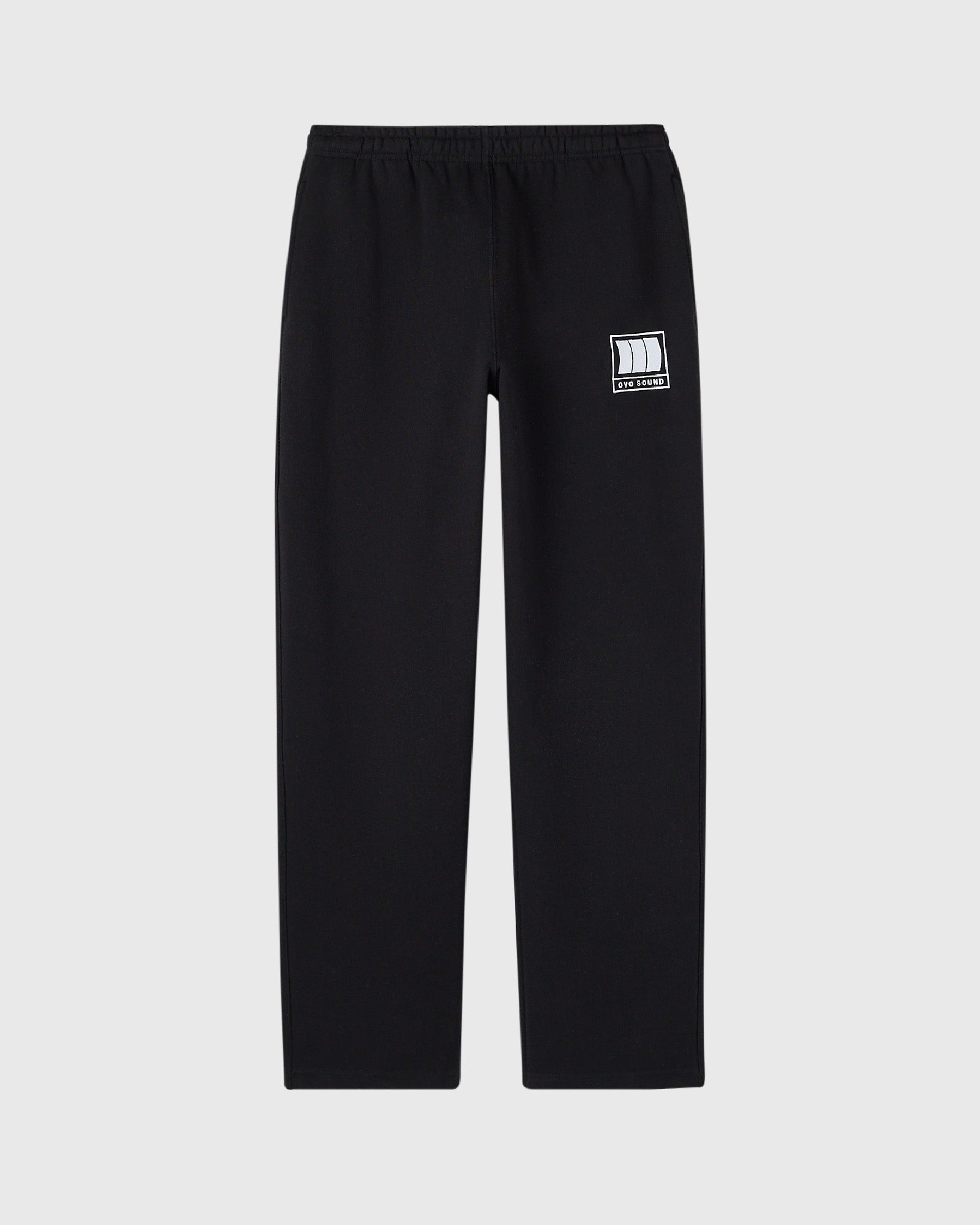 Black sweatpants with OVO Sound logo patch on right thigh and elastic waistband.