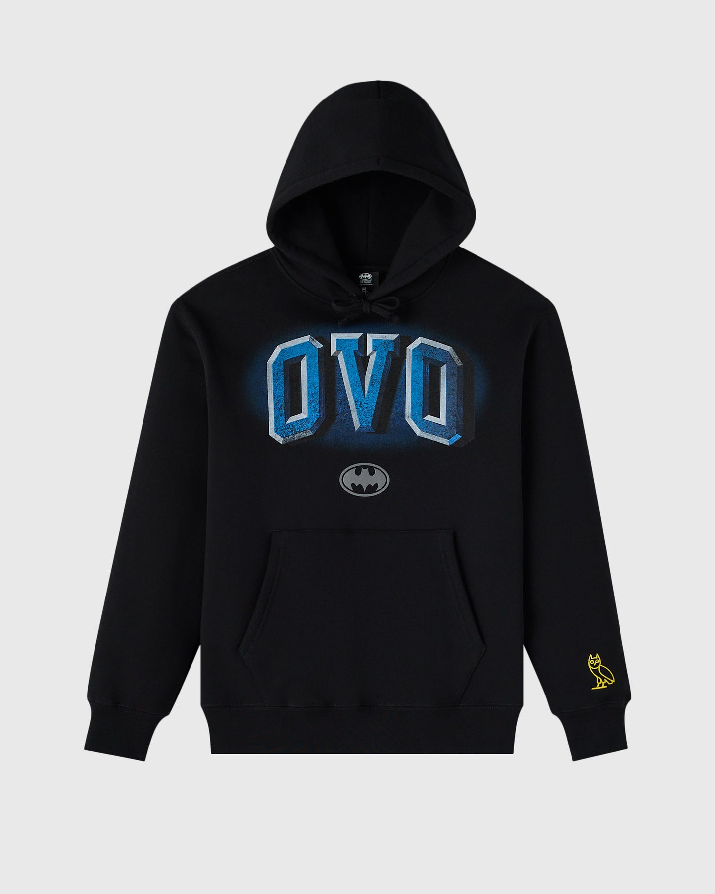 Black hoodie with blue "OVO" text, Batman logo, and yellow owl emblem on sleeve.