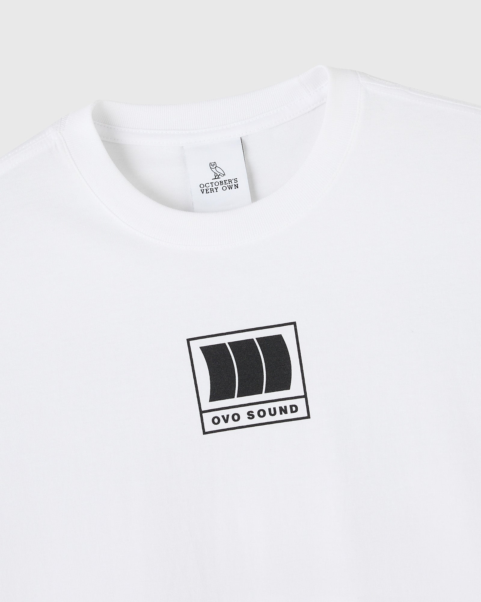 White crewneck t-shirt with OVO Sound graphic print on chest and interior neck label.