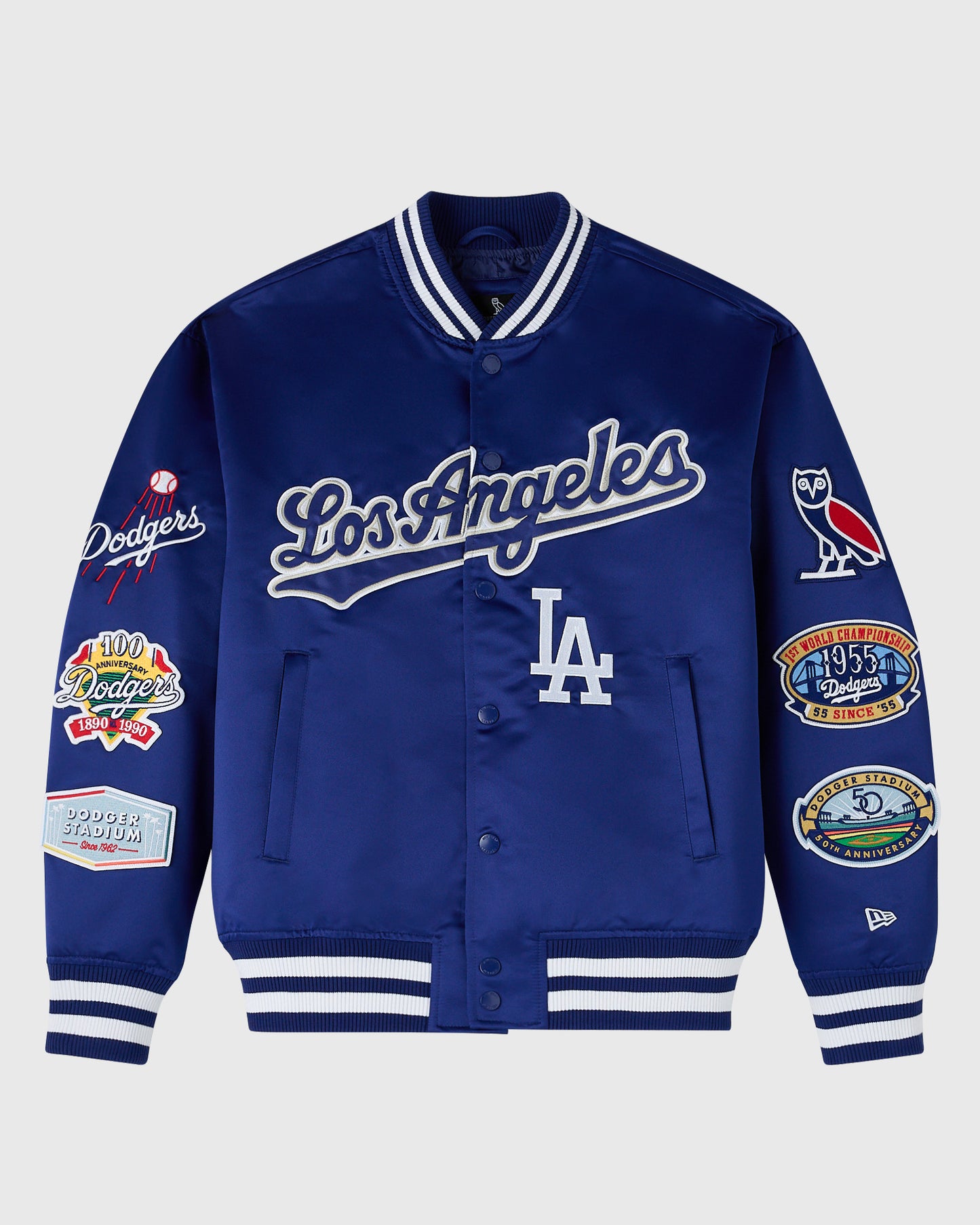 Navy blue Los Angeles Dodgers varsity jacket with white striping, embroidered logos on sleeves, and button front closure.