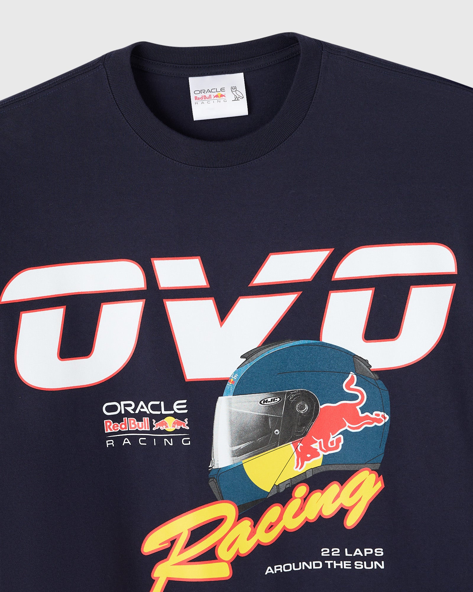 Navy crew neck tee with white and red "RB7" graphic, racing helmet, and Red Bull Racing branding.