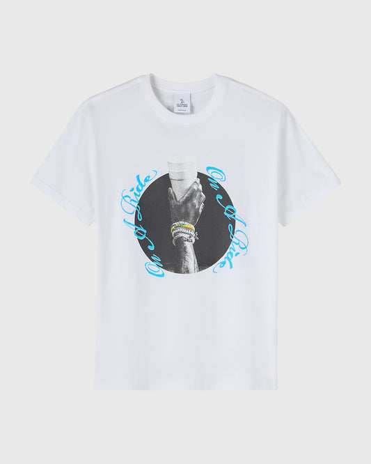 White t-shirt with black and white circular photograph of a hand wearing bracelets, surrounded by blue curved text.