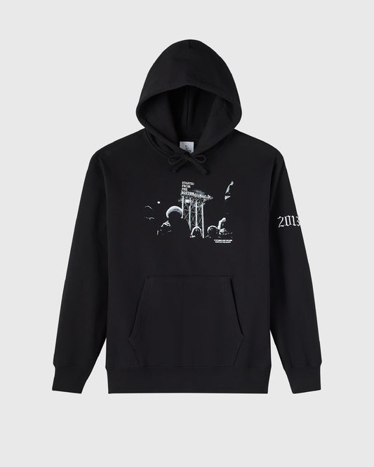 Black hoodie with white graphic print on chest and "2113" text on sleeve, featuring drawstring hood and front pocket.