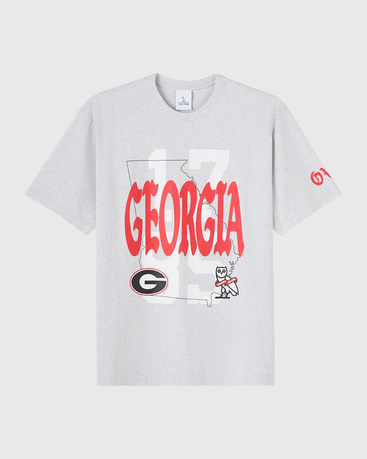 Ash heather grey t-shirt with Georgia state outline, red "GEORGIA" text, Bulldog logo, and mascot illustration on front.