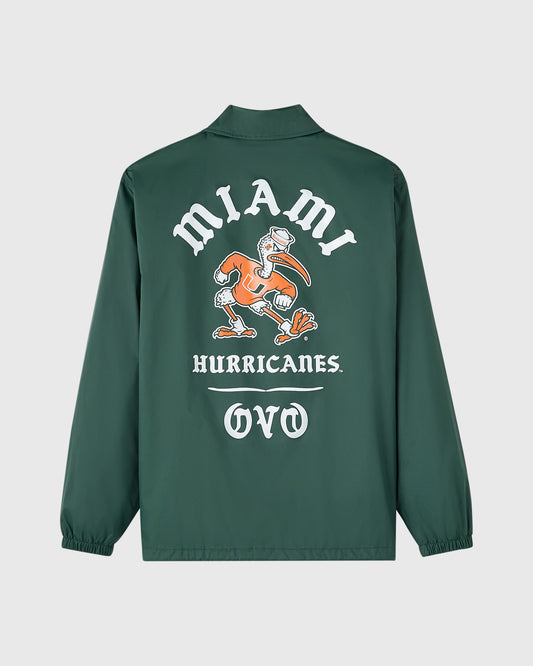 Green coaches jacket with "Miami Hurricanes" text and orange mascot graphic on back.