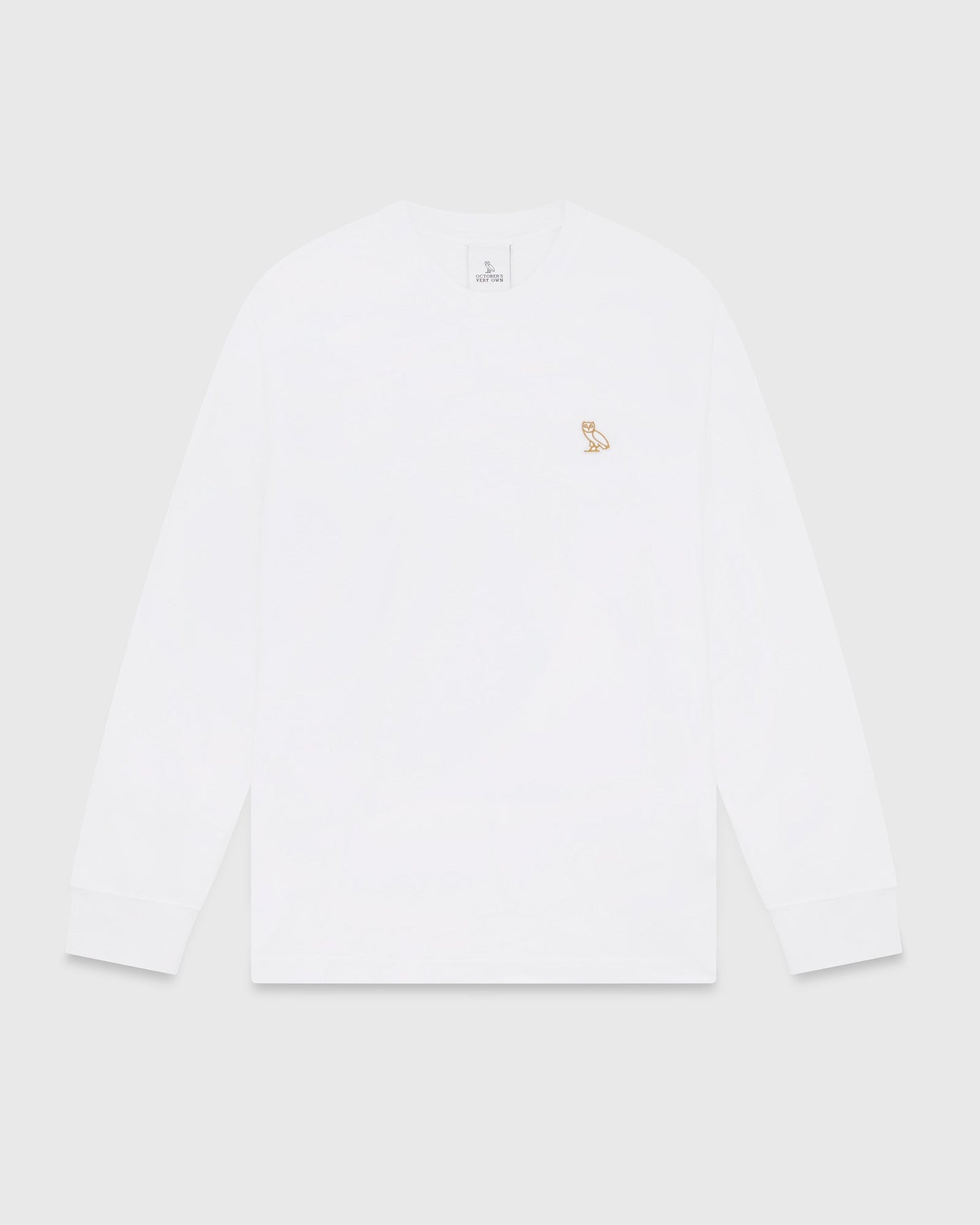 White long-sleeve t-shirt with small embroidered owl logo on chest.