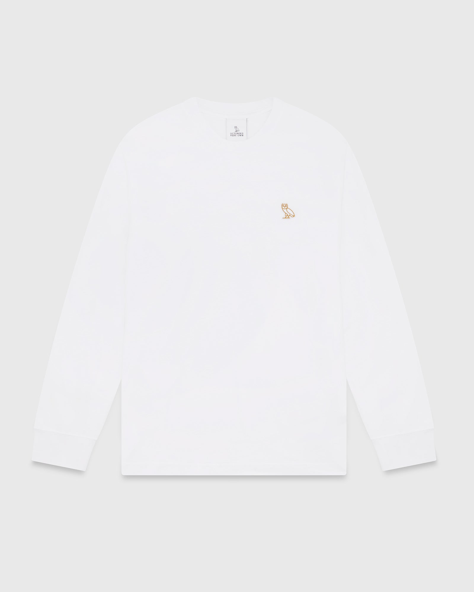 White long-sleeve t-shirt with small embroidered owl logo on chest.