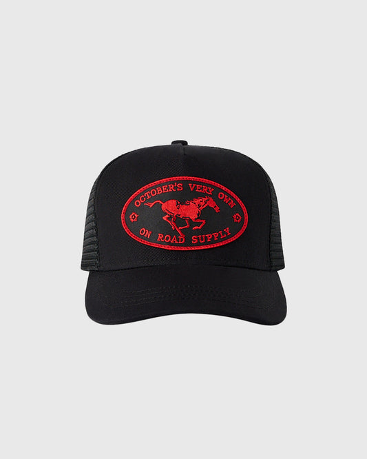 Black trucker hat with mesh back panels and red embroidered oval logo featuring horse and text.