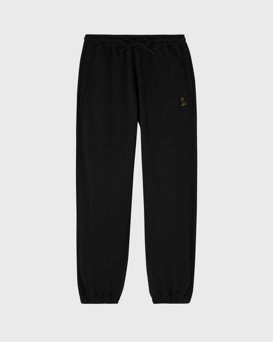 Black sweatpants with drawstring waist and small embroidered logo on thigh.