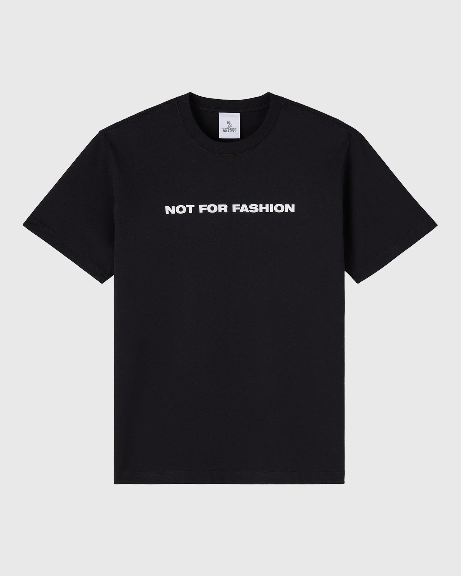 Black short-sleeve t-shirt with white "NOT FOR FASHION" text printed on center chest.