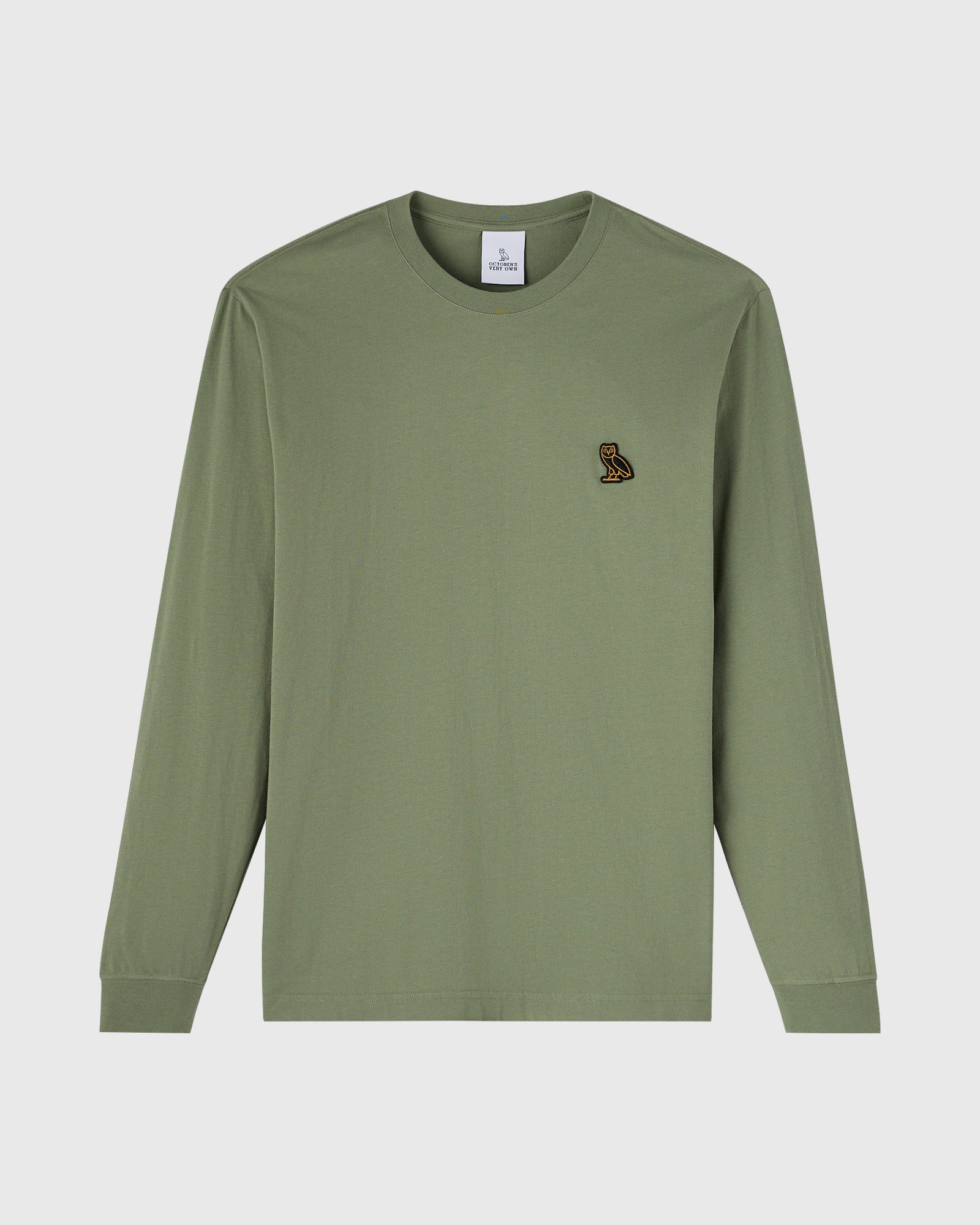 Sage green long-sleeve t-shirt with small bird embroidery on chest.