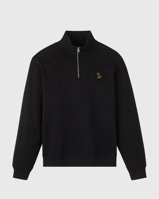 Black sweatshirt with quarter-zip mockneck and small gold logo on chest.