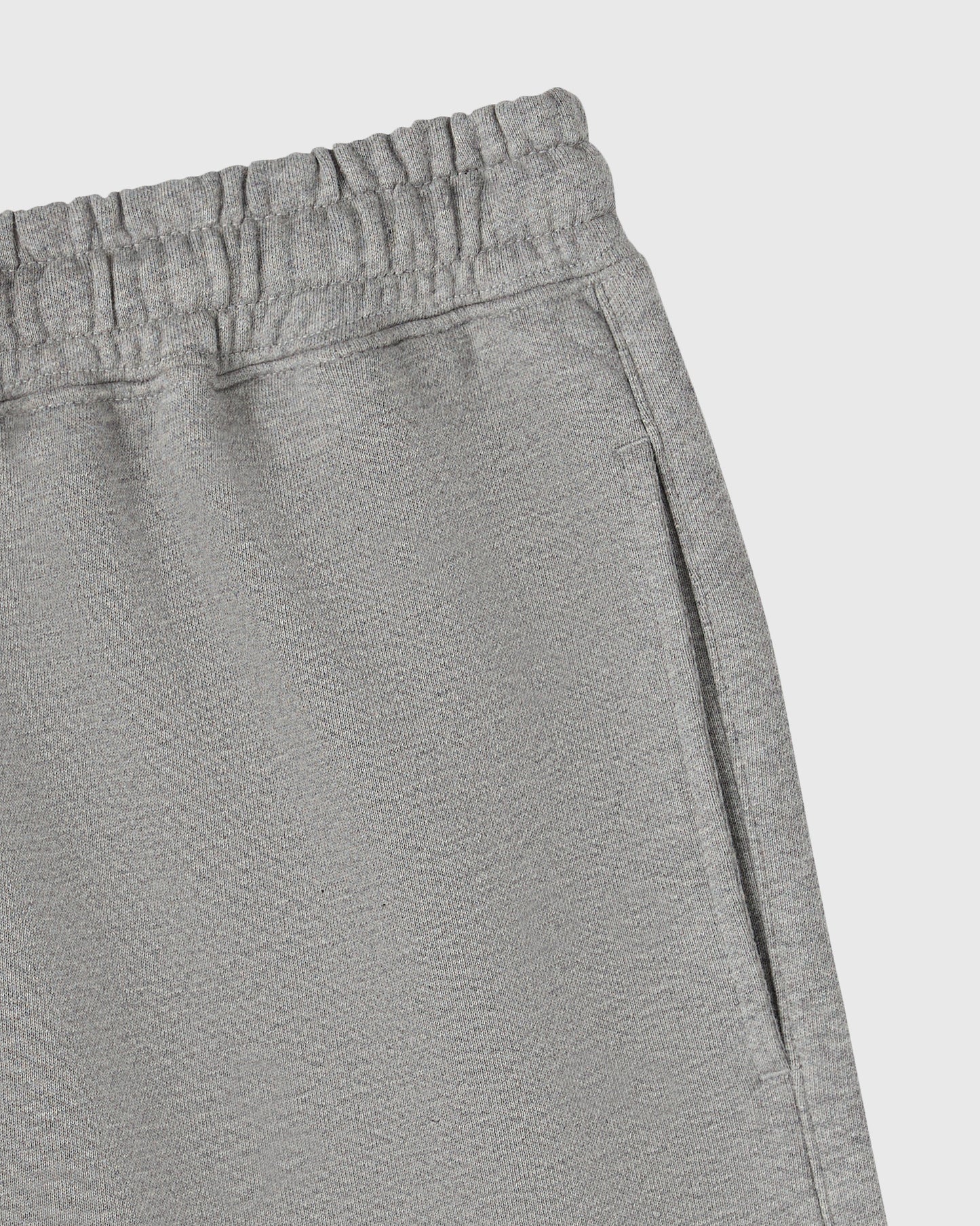 Heather grey sweatshort with elasticated waistband and side pocket detail.