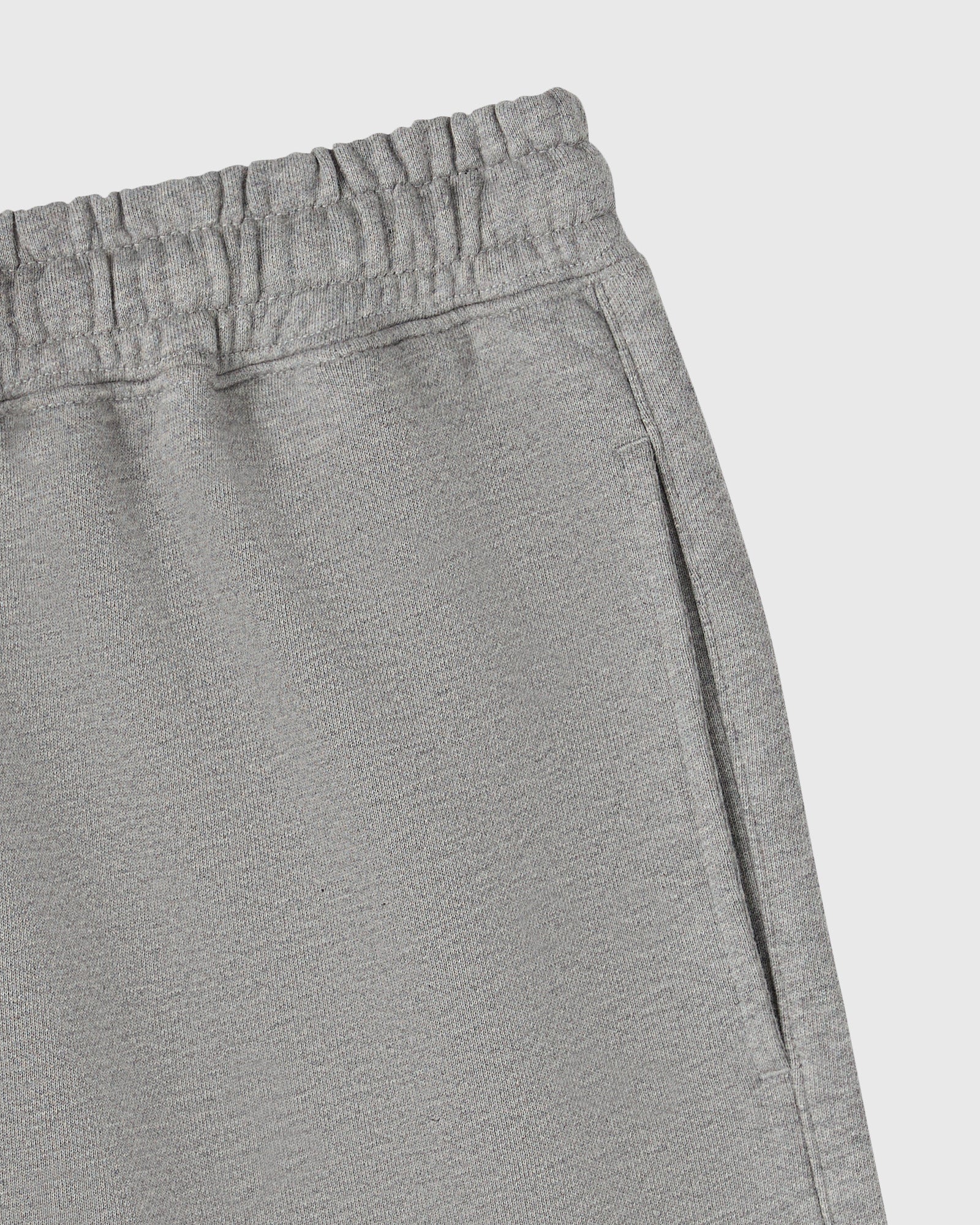 Heather grey sweatshort with elasticated waistband and side pocket detail.