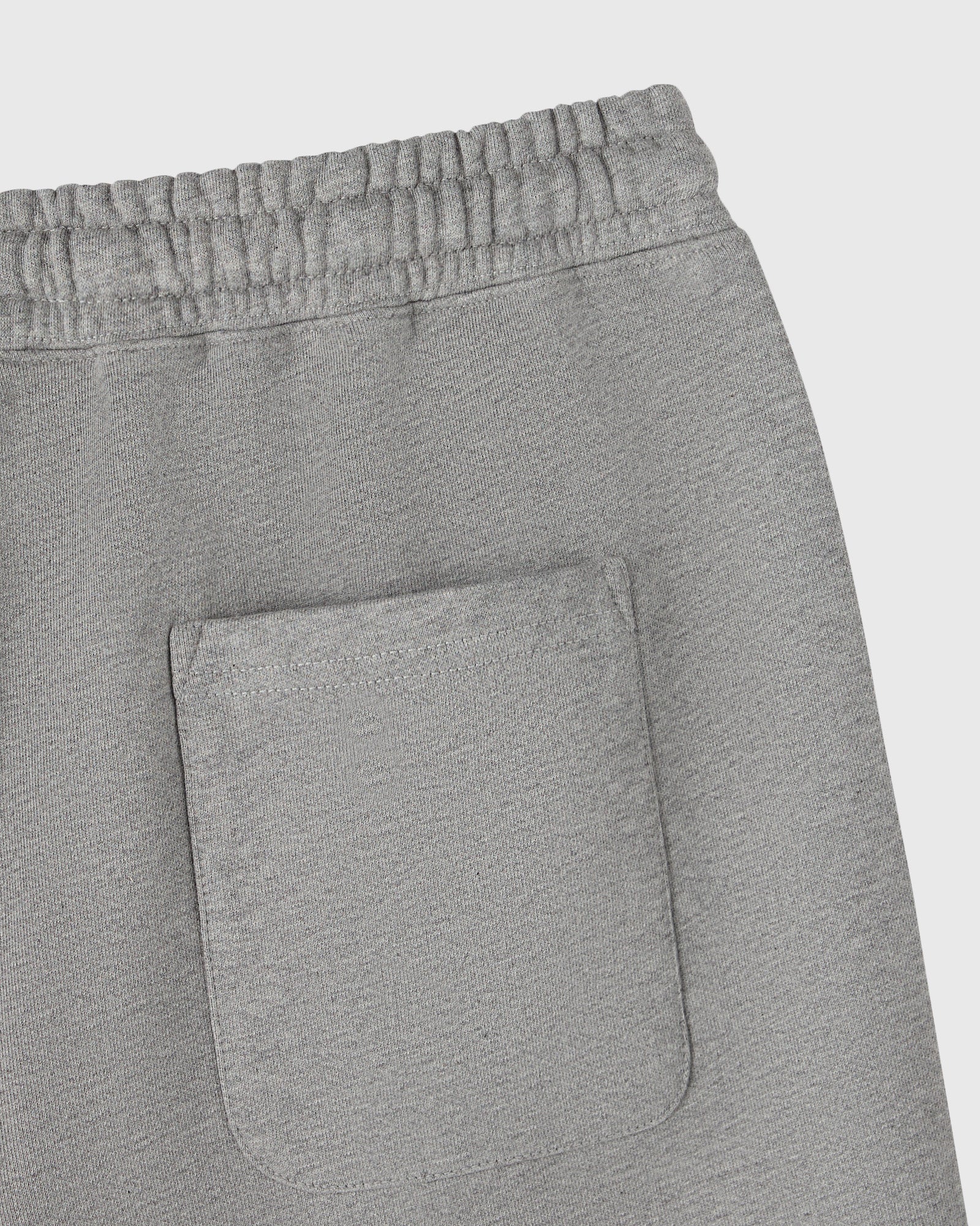 Heather grey sweatshorts with elasticated waistband and front patch pocket.