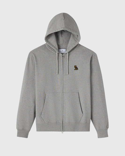 Heather grey full-zip hoodie with drawstring hood, kangaroo pockets, and small embroidered logo on chest.