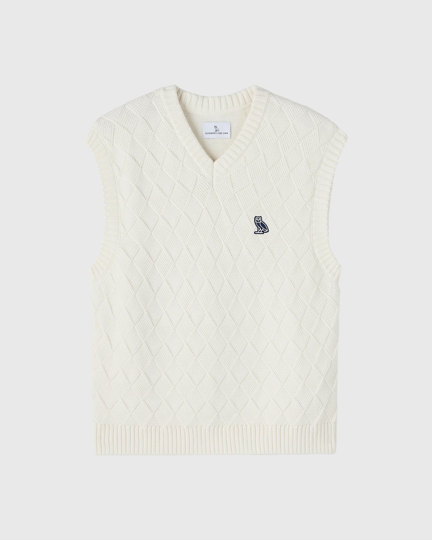 GILET EN MAILLE TRESSÉE – CRÈME