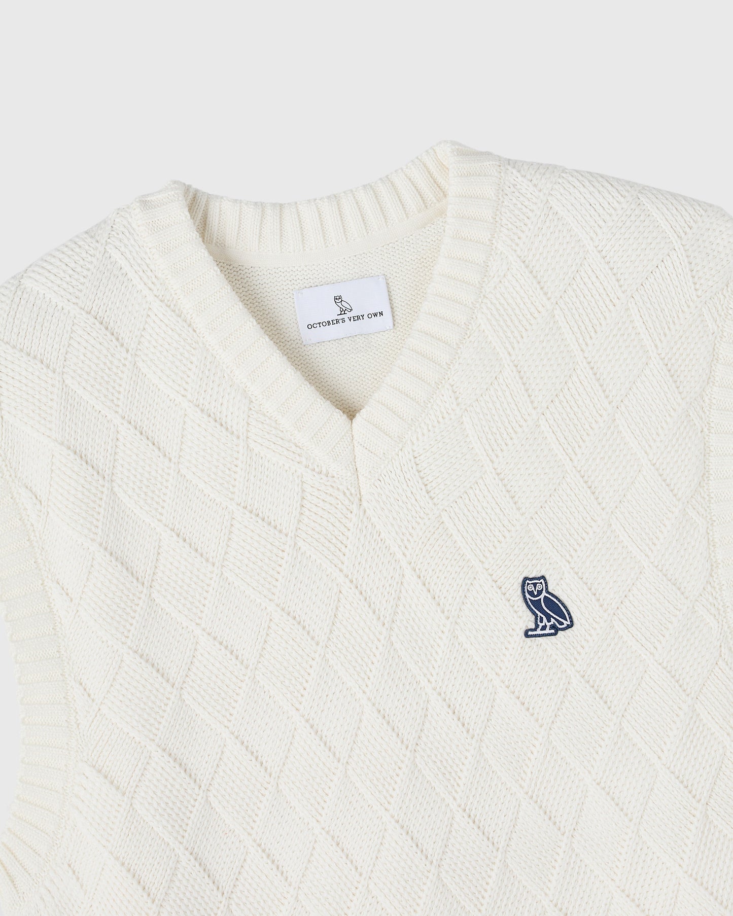 GILET EN MAILLE TRESSÉE – CRÈME