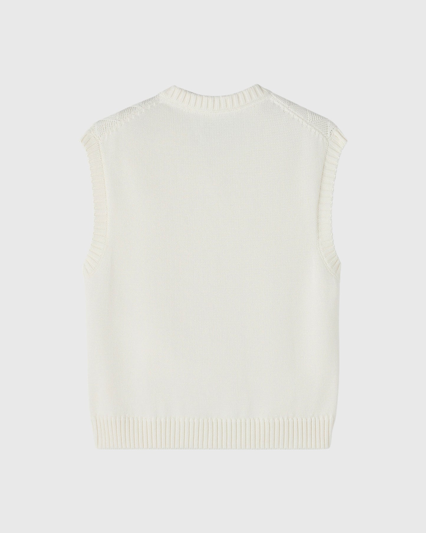 GILET EN MAILLE TRESSÉE – CRÈME