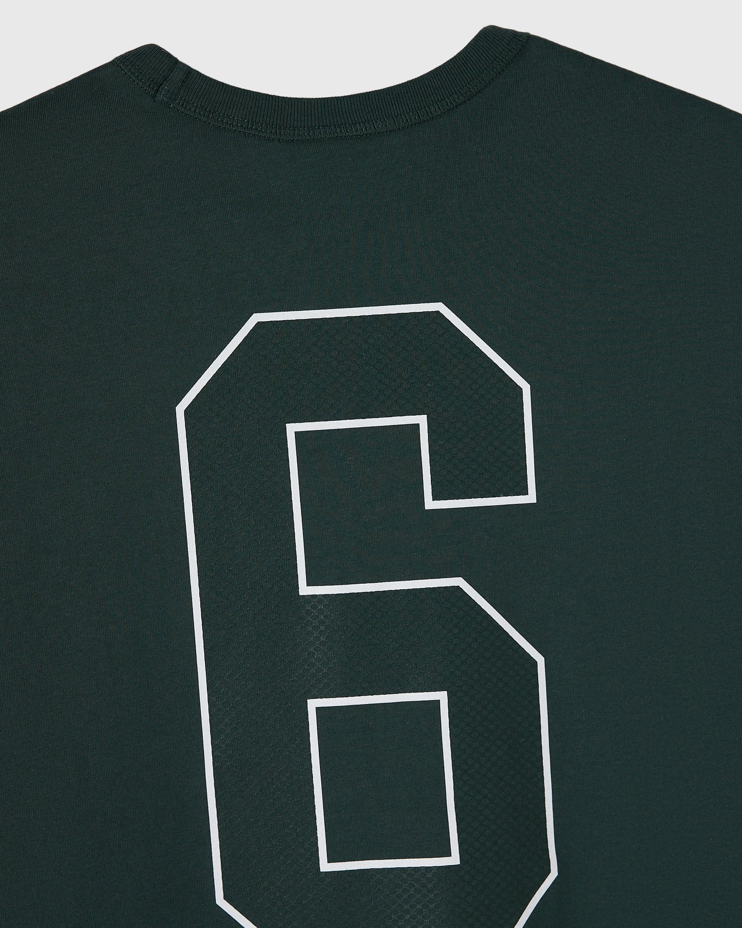 Midnight green muscle tee with white outlined number 6 print on chest and ribbed crew neckline.
