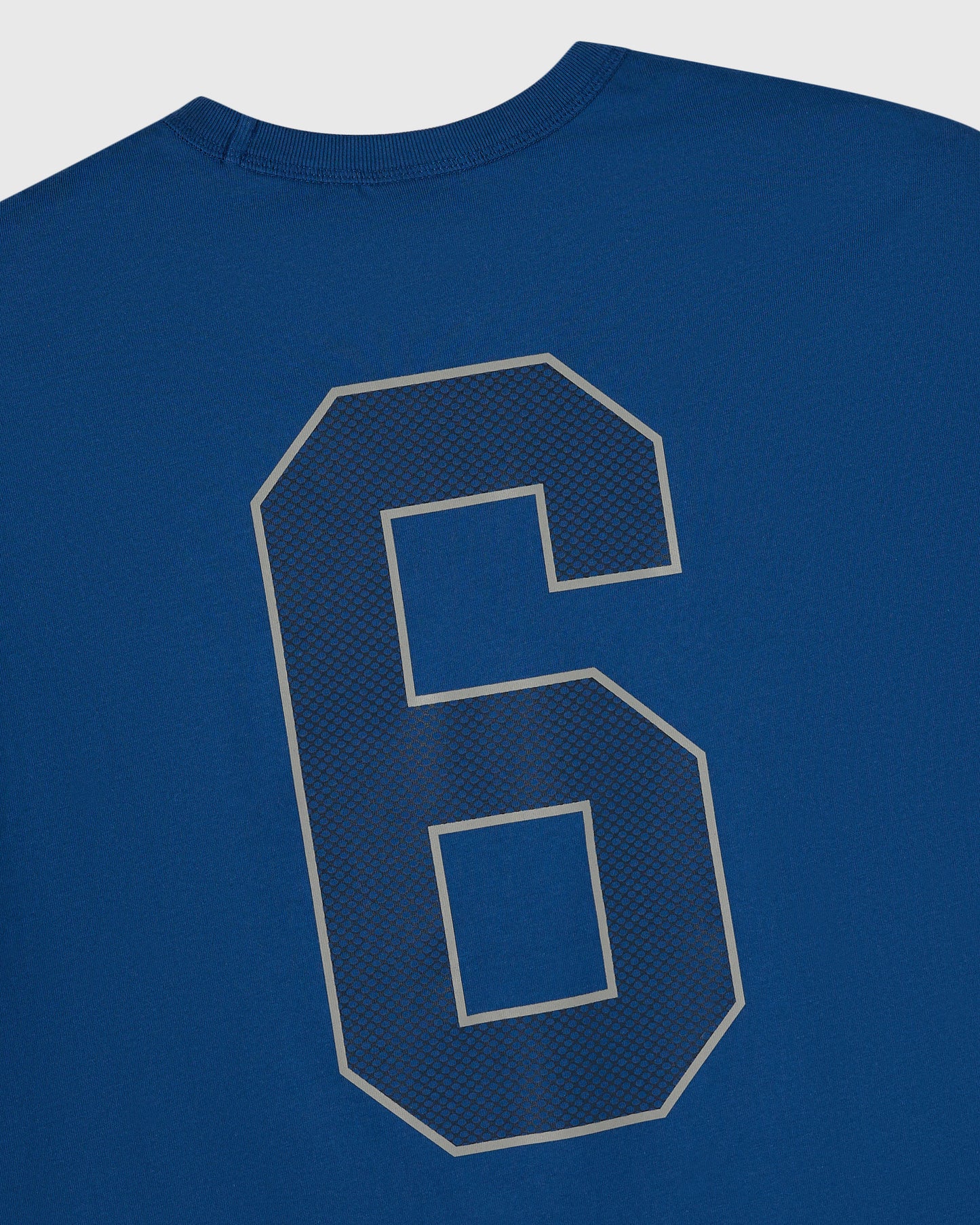 Deep denim muscle tee with large tan outlined number 6 graphic featuring mesh texture fill on chest.