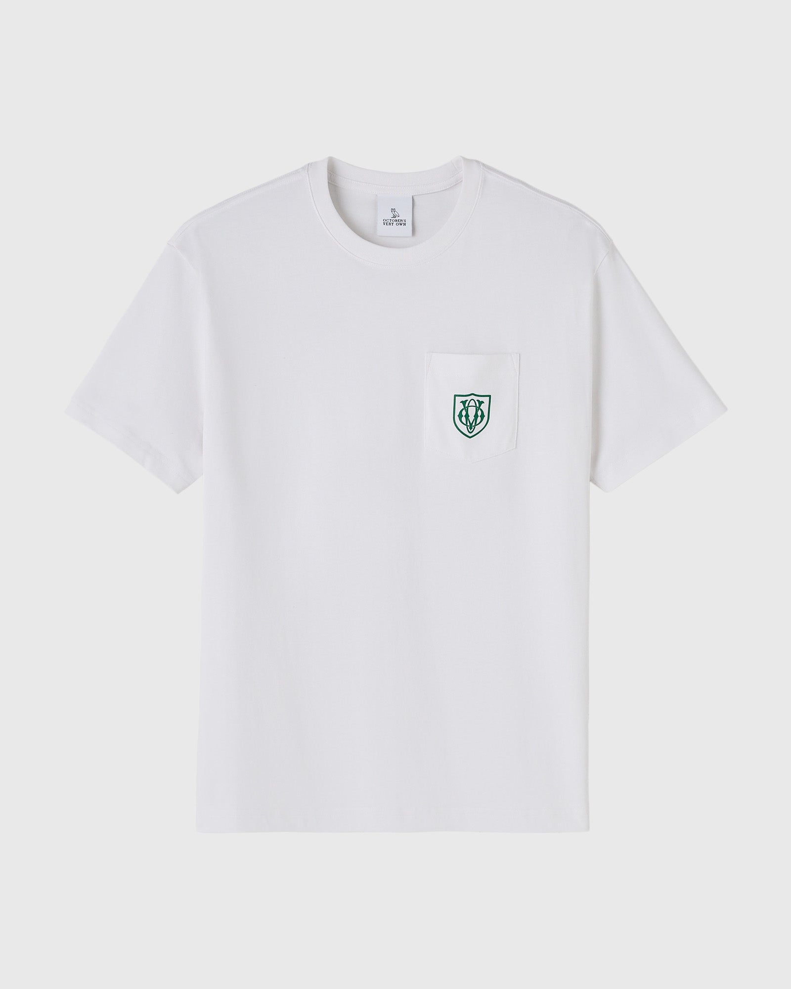 White short-sleeve t-shirt with chest pocket featuring small green owl shield logo.