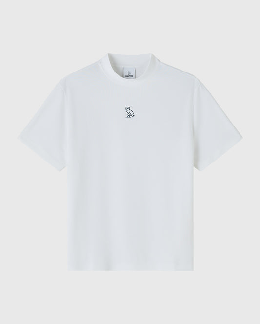 White short-sleeve mockneck tee with small owl logo embroidered on chest.