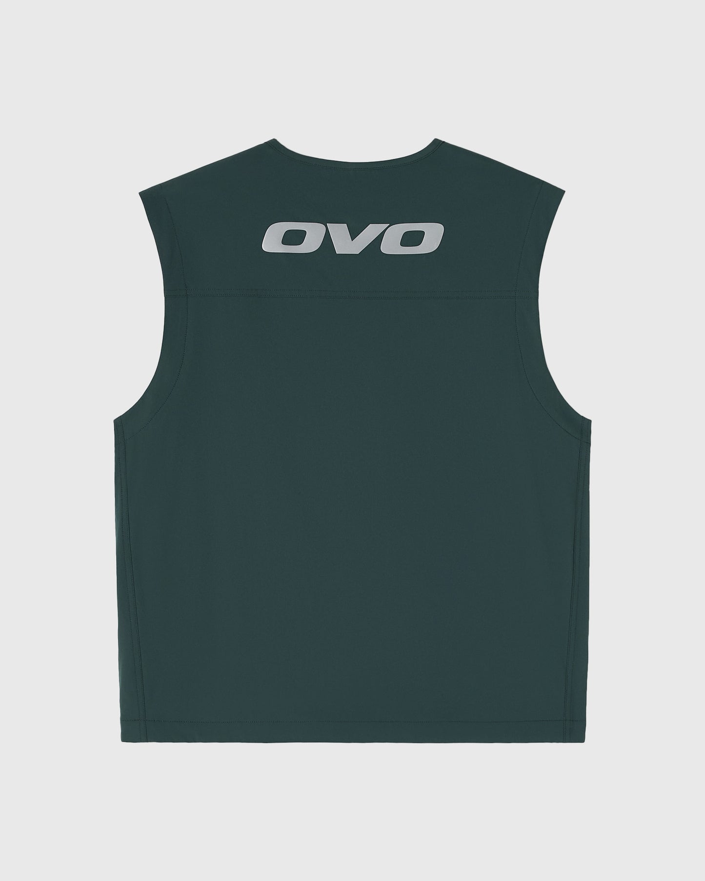 Midnight green sleeveless vest with OVO logo printed on chest.