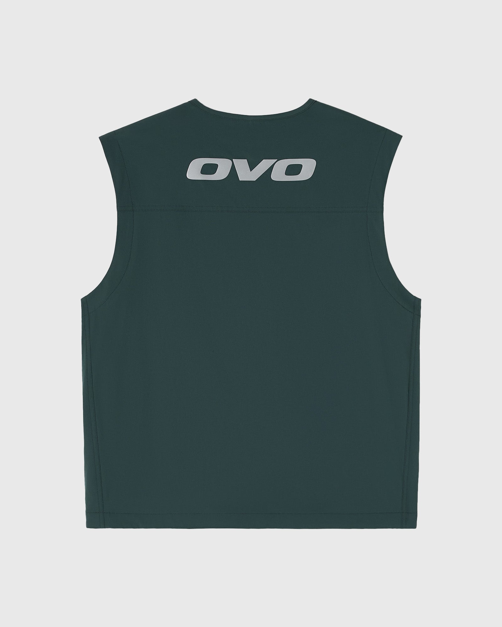 Midnight green sleeveless vest with OVO logo printed on chest.