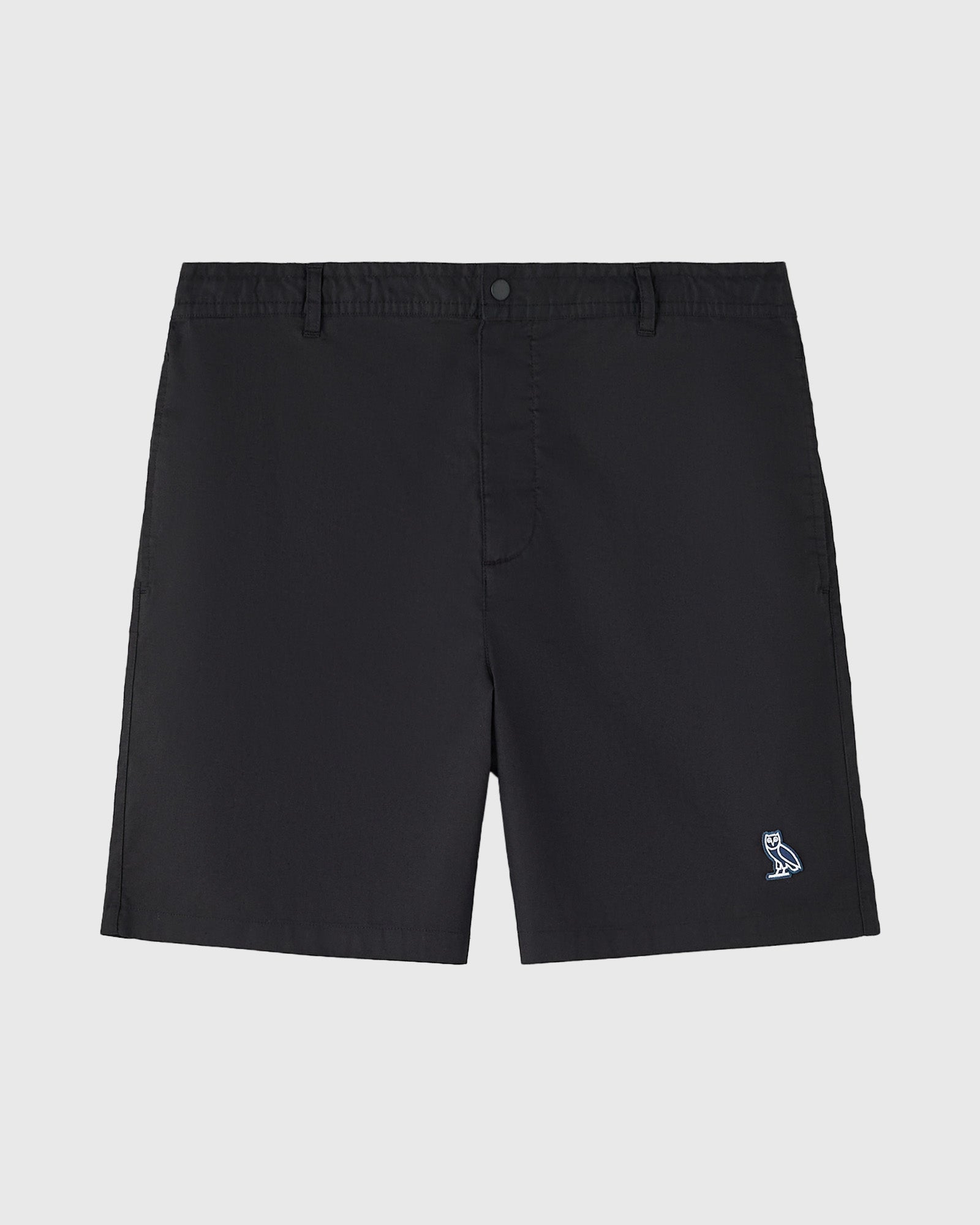 Black shorts with flat front, button closure, side pockets, and small owl logo on leg.